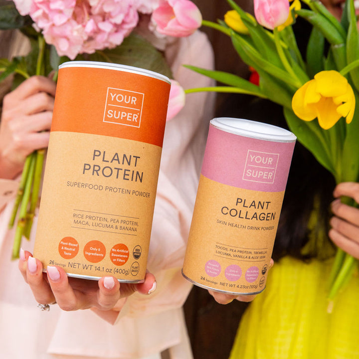 Two women holding Plant Protein, Plant Collagen, and bunches of flowers